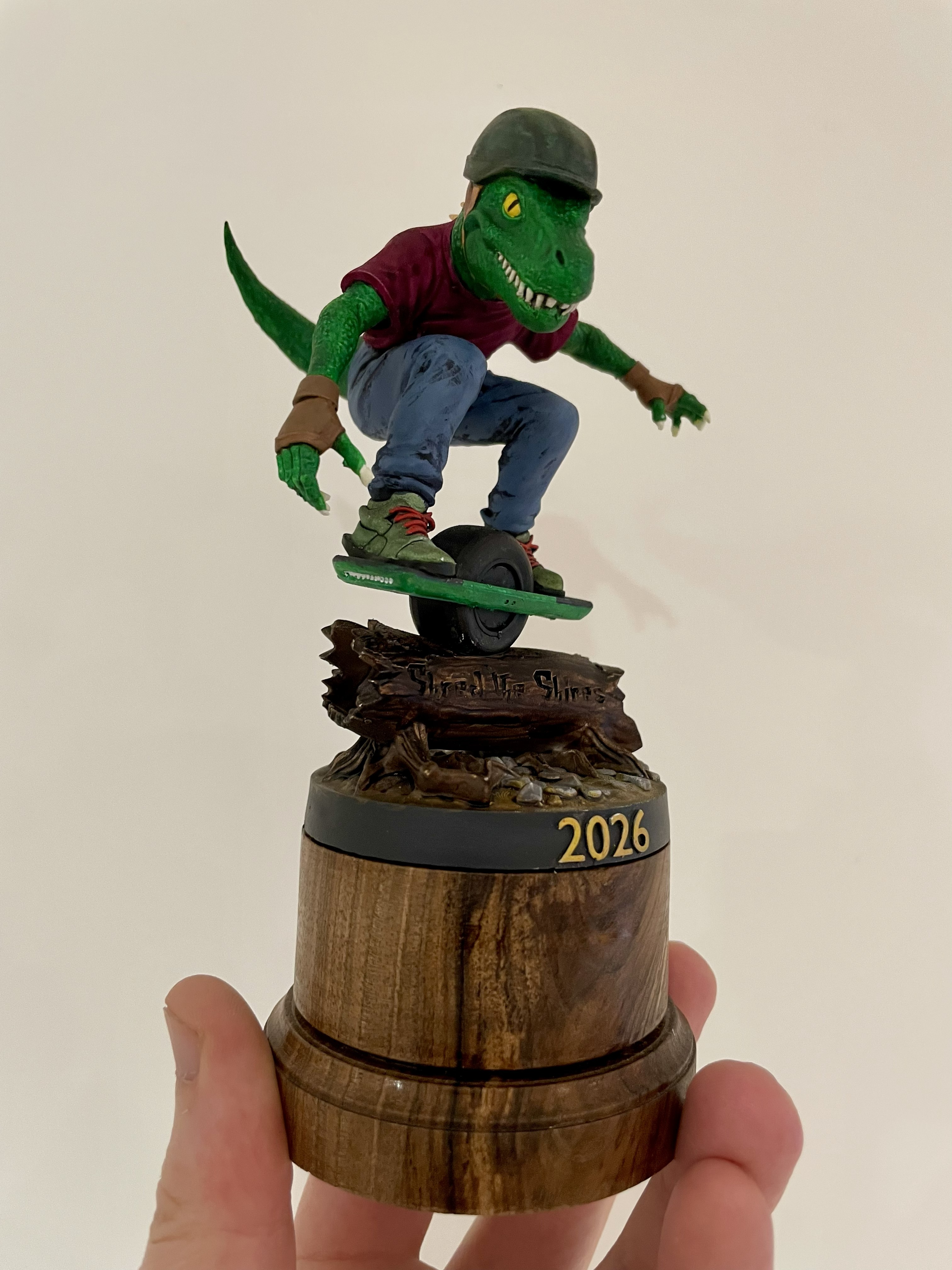 Shred the Shires 2026 trophy: a painted rider figure on a turned wooden base